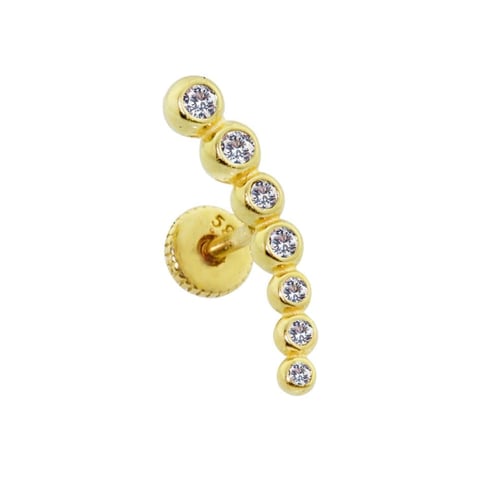 Seven Round Cut Gold Piercing